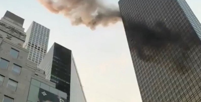 A smoke is seen rising from the roof of Trump Tower, in New York A smoke is seen rising from the roof of Trump Tower, in New York