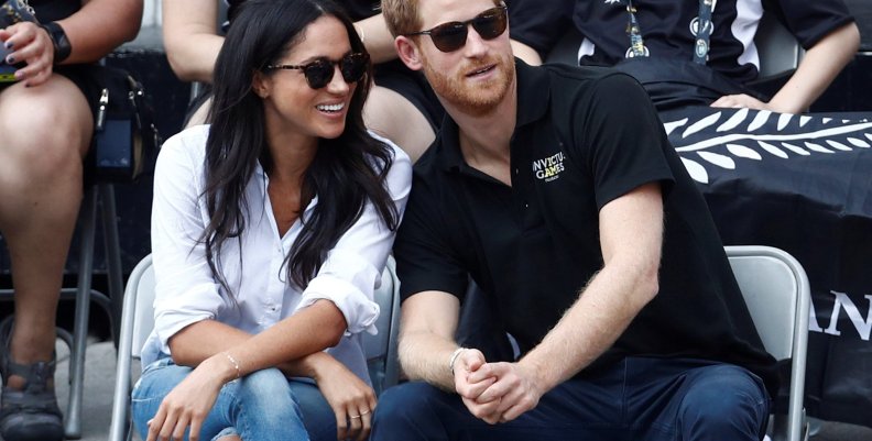 FILE PHOTO: Britain's Prince Harry sits with girlfriend actress Markle to watch a wheelchair tennis event during the Invictus Games in Toronto FILE PHOTO: Britain's Prince Harry sits with girlfriend actress Markle to watch a wheelchair tennis event during the Invictus Games in Toronto