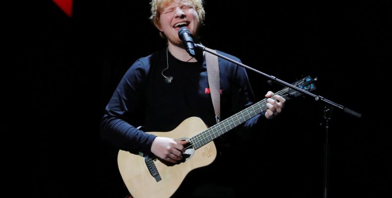 FILE PHOTO: Ed Sheeran performs during the 2017 Jingle Ball at Madison Square Garden in New York FILE PHOTO: Ed Sheeran performs during the 2017 Jingle Ball at Madison Square Garden in New York