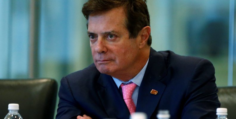 FILE PHOTO: Manafort of Republican presidential nominee Trump's staff listens during a round table discussion on security at Trump Tower in the Manhattan borough of New York