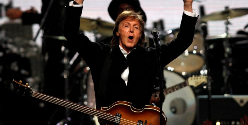 FILE PHOTO - Paul McCartney celebrates after performing with Starr during the 2015 Rock and Roll Hall of Fame Induction Ceremony in Cleveland FILE PHOTO - Paul McCartney celebrates after performing with Starr during the 2015 Rock and Roll Hall of Fame Induction Ceremony in Cleveland