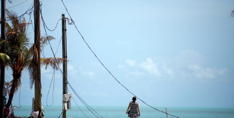 Lora Castelo stands at a trailer park were her home used to be in Islamorada after Hurricane Irma struck Florida, in Islamorada Lora Castelo stands at a trailer park were her home used to be in Islamorada after Hurricane Irma struck Florida, in Islamorada
