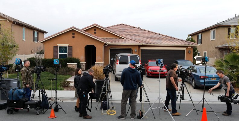 Members of the news media stand outside the home of the Turpins in Perris Members of the news media stand outside the home of the Turpins in Perris