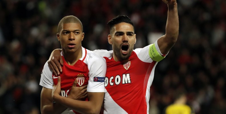 Monaco's Kylian Mbappe-Lottin celebrates scoring their first goal with Radamel Falcao Monaco's Kylian Mbappe-Lottin celebrates scoring their first goal with Radamel Falcao
