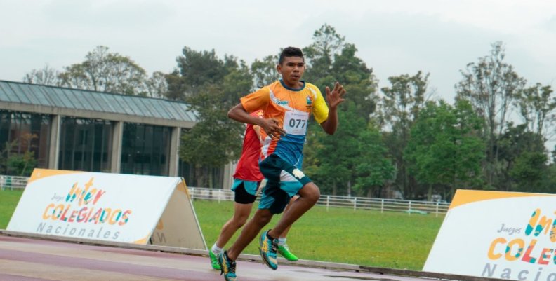 Juegos Parapanamericanos Dos atletas con en una pista de atletismo