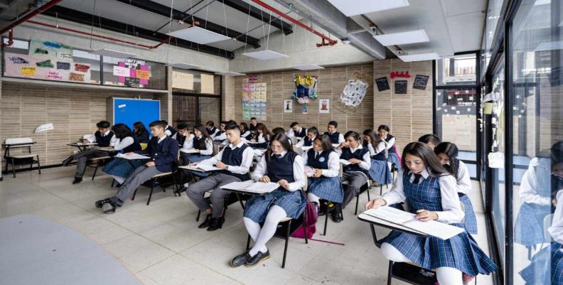 Estudiantes en aula de clases