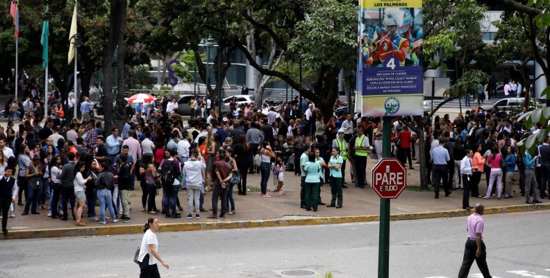 People gather in the street after an earthquake in Caracas People gather in the street after an earthquake in Caracas