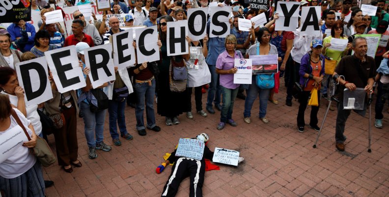 People take part in a protest against medicinal shortages in Caracas People take part in a protest against medicinal shortages in Caracas