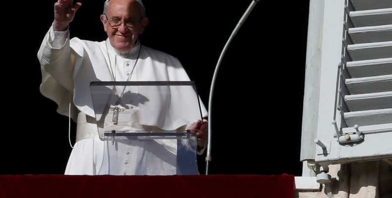 Pope Francis waves during his Sunday Angelus prayer, on the day of his birthday, in Saint Peter's square at the Vatican Pope Francis waves during his Sunday Angelus prayer, on the day of his birthday, in Saint Peter's square at the Vatican