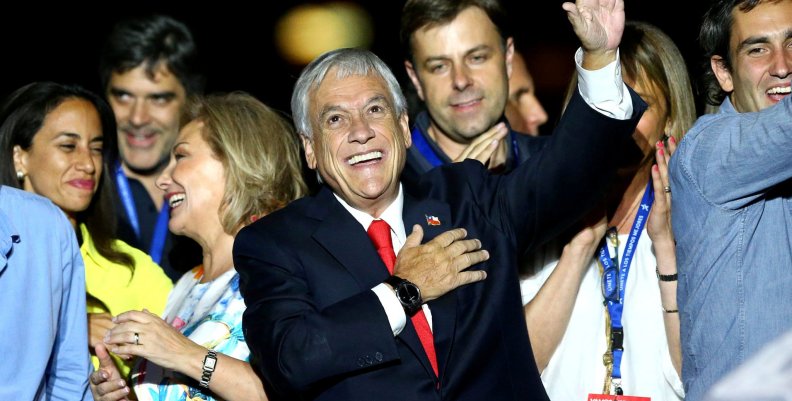 Presidential candidate Sebastian Pinera gestures after winning the presidential election, in Santiago, Chile Presidential candidate Sebastian Pinera gestures after winning the presidential election, in Santiago, Chile
