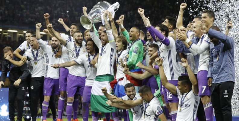 Real Madrid's Sergio Ramos celebrates with the trophy after winning the UEFA Champions League Final