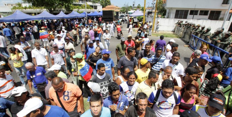 Supporters of Andres Velasquez, the candidate of the MUD for the Bolivar state governor office, attend a gathering near the regional office of the National Electoral Council, in Ciudad Bolivar Supporters of Andres Velasquez, the candidate of the MUD for the Bolivar state governor office, attend a gathering near the regional office of the National Electoral Council, in Ciudad Bolivar
