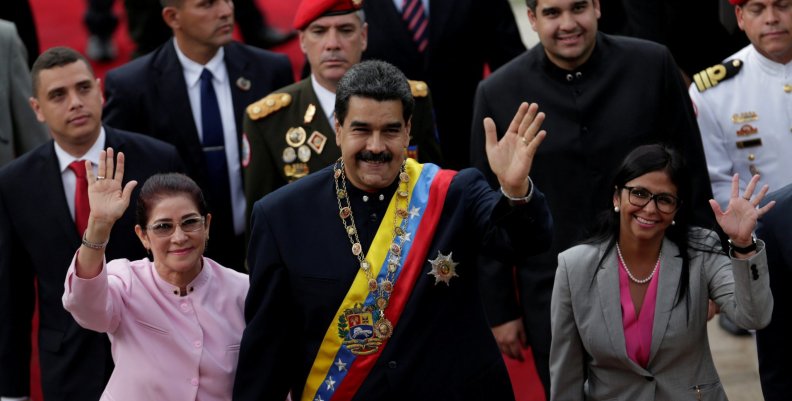 Venezuela's President Nicolas Maduro, his wife Cilia Flores and National Constituent Assembly President Delcy Rodriguez, wave as they arrive for a session of the assembly at Palacio Federal Legislativo in Caracas Venezuela's President Nicolas Maduro, his wife Cilia Flores and National Constituent Assembly President Delcy Rodriguez, wave as they arrive for a session of the assembly at Palacio Federal Legislativo in Caracas