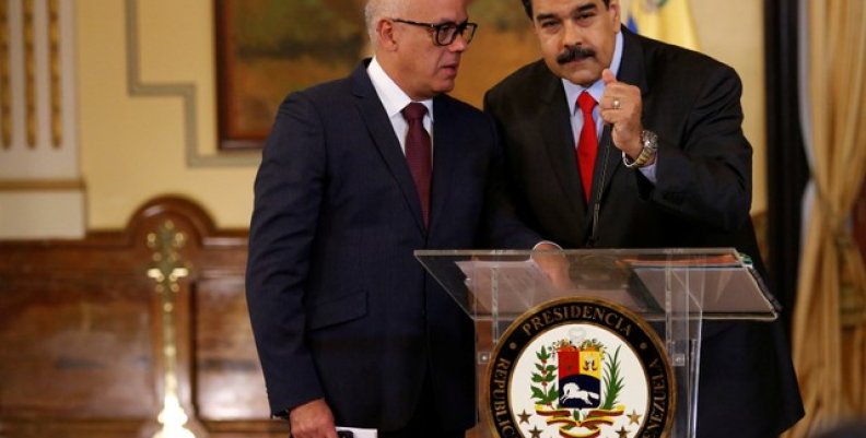 Venezuela's President Nicolas Maduro listens to Venezuela's Communications and Information Minister Jorge Rodriguez during a news conference in Caracas Venezuela's President Nicolas Maduro listens to Venezuela's Communications and Information Minister Jorge Rodriguez during a news conference in Caracas