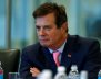 FILE PHOTO: Manafort of Republican presidential nominee Trump's staff listens during a round table discussion on security at Trump Tower in the Manhattan borough of New York