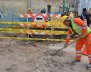 Maestros de obra trabajando en la malla vial de Bogotá