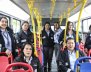 Mujeres trabajadoras de La Rolita posando en el interior de uno de los buses de la flota. 