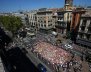 People gather at an impromptu memorial where a van crashed into pedestrians at Las Ramblas in Barcelona