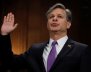 Wray is sworn in prior to testifying before Senate Judiciary Committee confirmation hearing on Capitol Hill in Washington