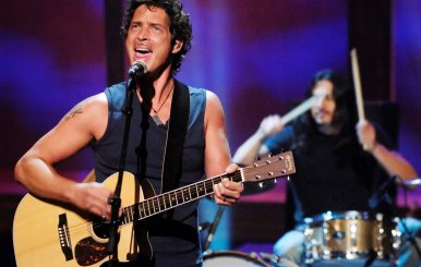 FILE PHOTO: Chris Cornell and Brad Wilk of music group Audioslave perform live during the "ReAct Now: Music &amp; Relief" special at Paramount Studios in Los Angeles