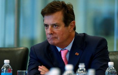 FILE PHOTO: Manafort of Republican presidential nominee Trump's staff listens during a round table discussion on security at Trump Tower in the Manhattan borough of New York