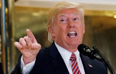 FILE PHOTO: President Trump answers questions about the violence, injuries and deaths in Charlottesville in New York