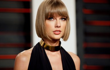 FILE PHOTO: Singer Taylor Swift arrives at the Vanity Fair Oscar Party in Beverly Hills